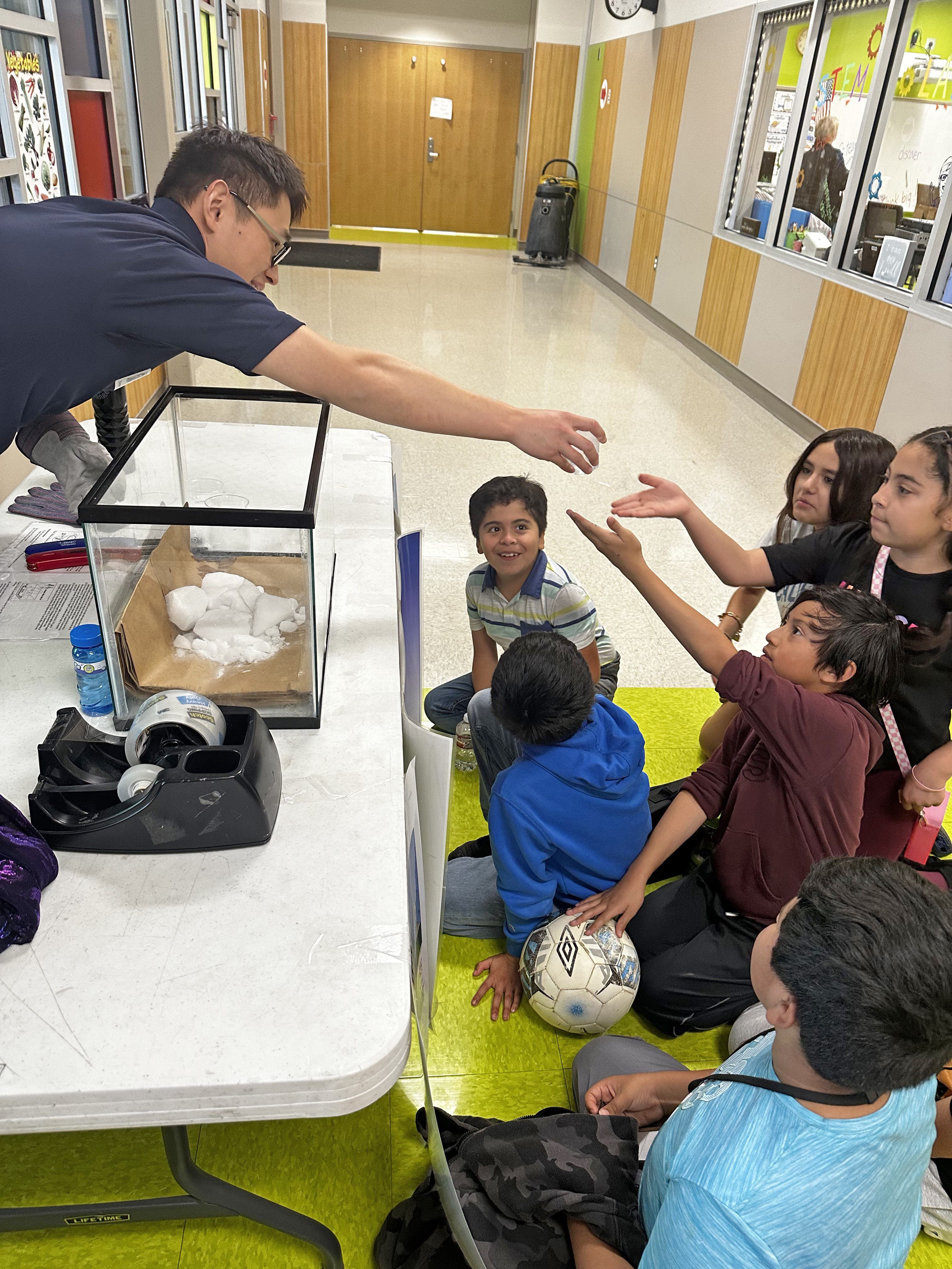 Dr. Wang engages students