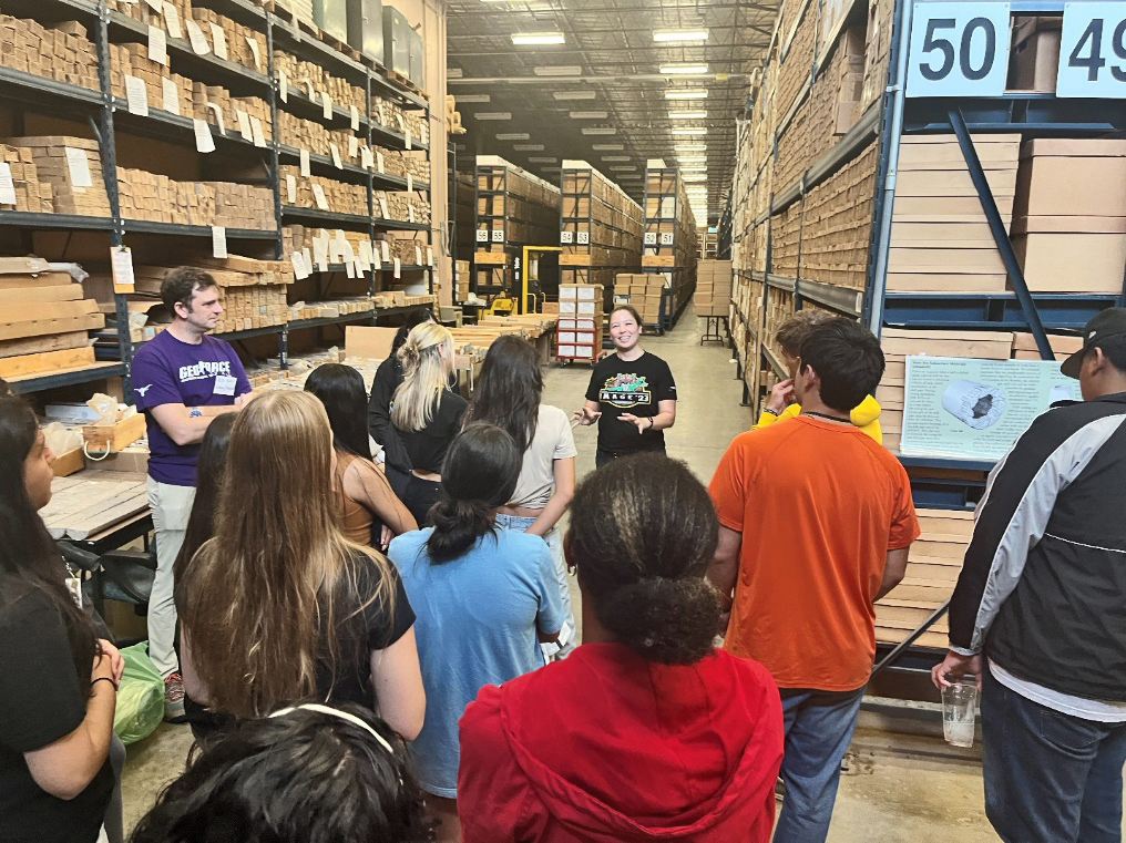 Bureau researcher Kelly Hattori leading GeoFORCE students on a tour of the Core Research Center at the Bureau of Economic Geology