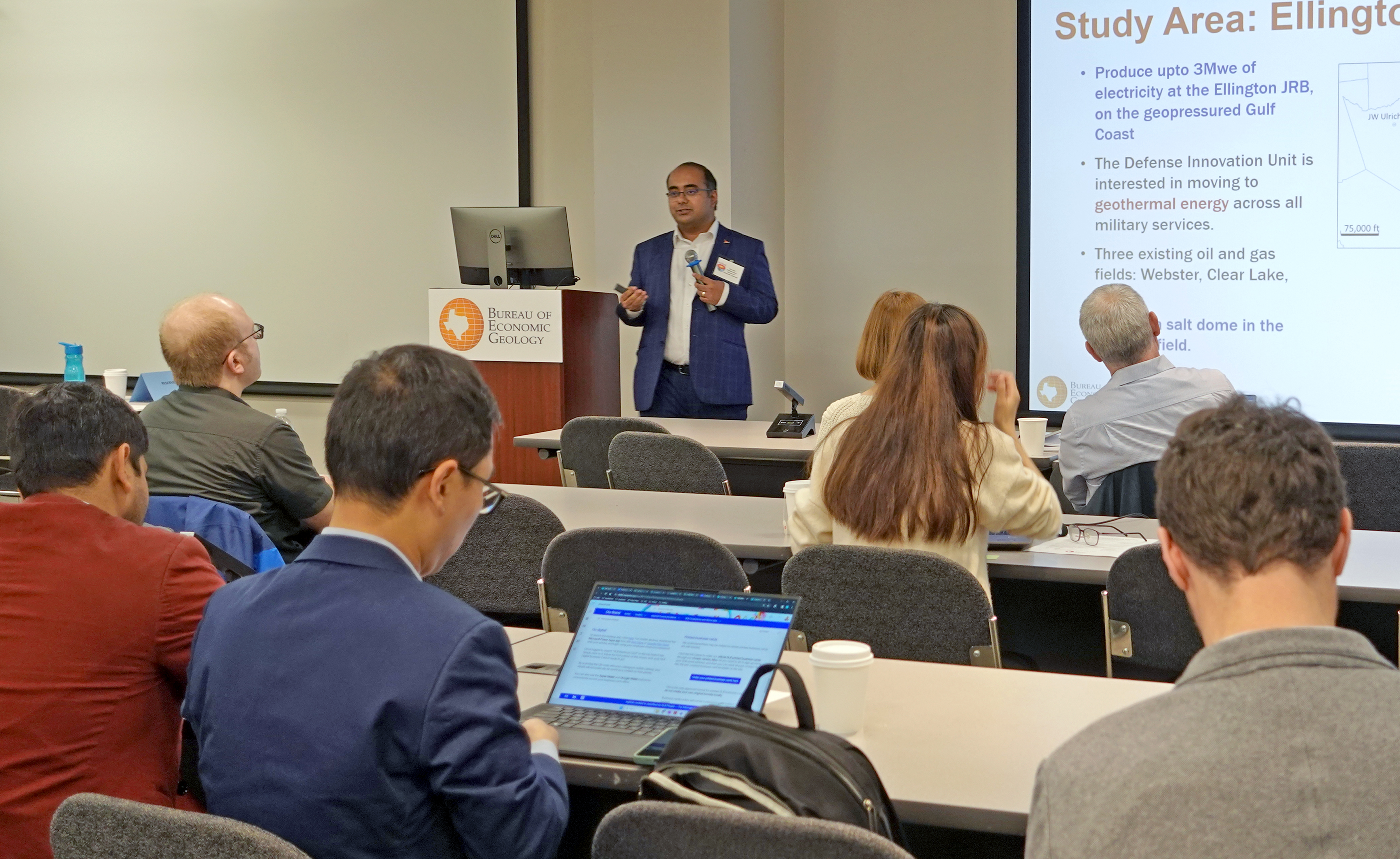 A researcher (Dr. Shuvajit Bhattacharya) engages his audience with a slide presentation to discuss HotRock’s recent research findings.