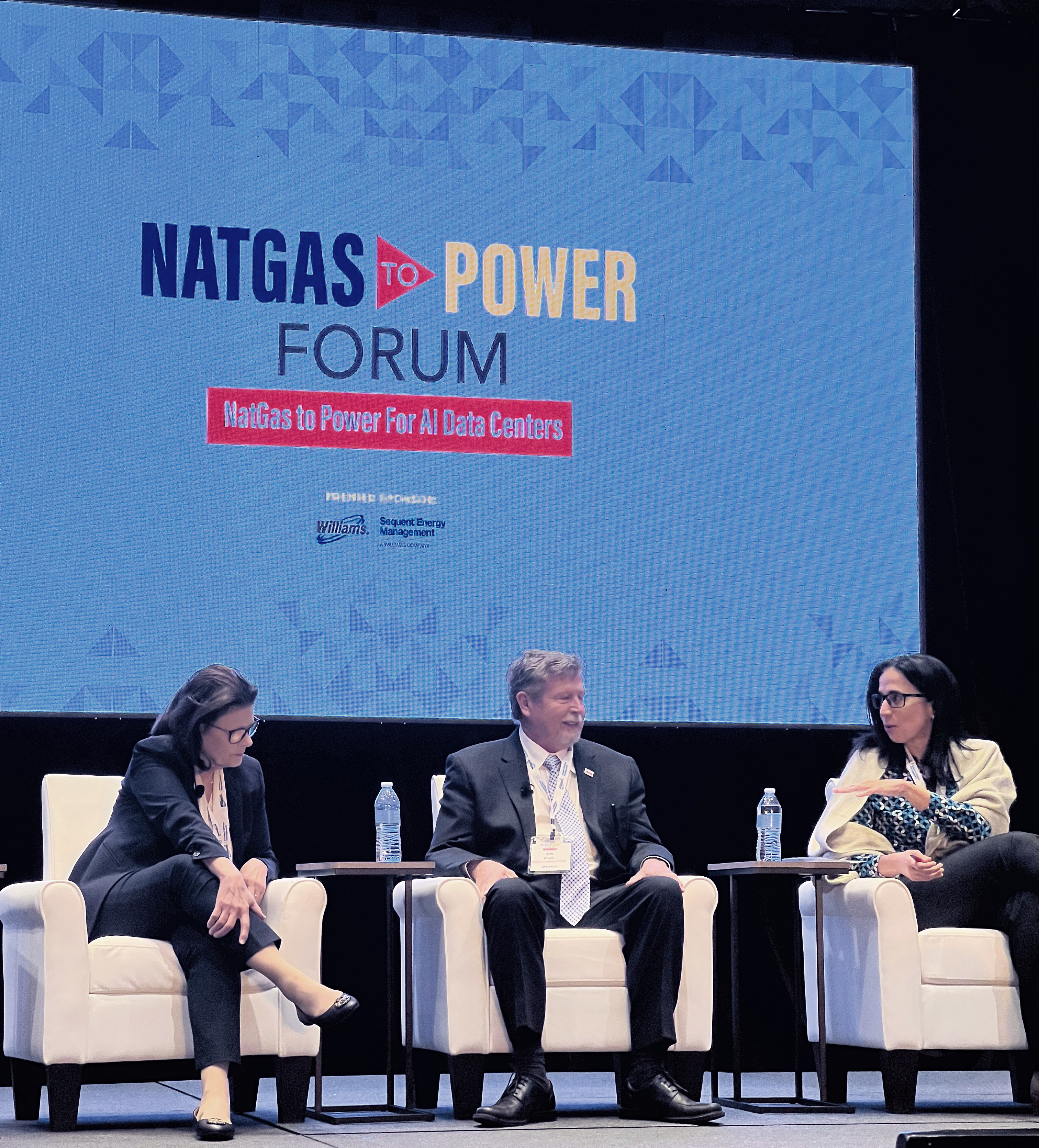 A conversation on large-loads in Texas, with Lorena Moscardelli (right), Commissioner Kathleen Jackson (left) from the Public Utility Commission of Texas, and Chairman Jim Wright (center) from the Railroad Commission of Texas.