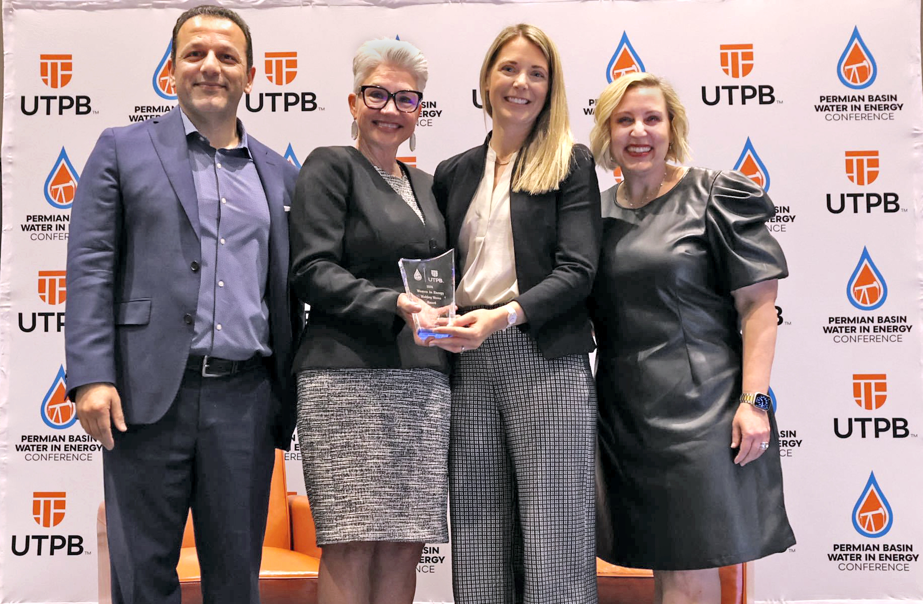 Katie Smye accepts the Woman in Energy: Making Waves Award.