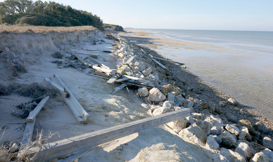 Figure H6. Hurricane Harvey debris and Harvey-related erosion above riprap along Matagorda Bay at Powderhorn Ranch.