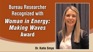Katie Smye accepts the Woman in Energy: Making Waves Award.