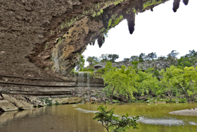 Stalactites of tufa form from waterfalls over the Cow Creek lip.